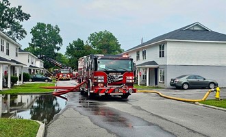 Attic Fire in Apartment Building Contained with Coordinated Interior Attack