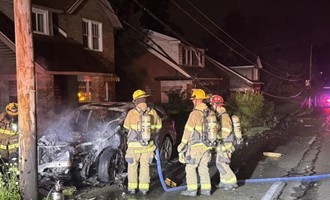 Firefighters Battle Vehicle Fire Following Utility Pole Collision