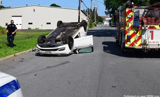 Vehicle into pole rollover