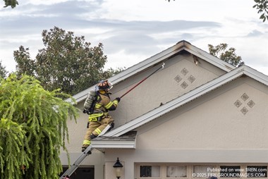 Villages Firefighter Overhauls a Soffit after a Recent Lightning Strike