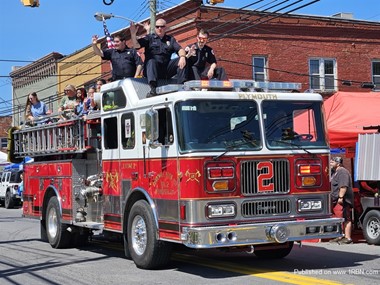 The crew from the Goodwill Hose Co. No.2 Riding on engine 2