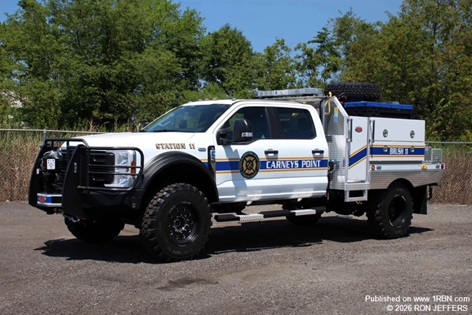 Carneys Point Brush 11 is a new Ford F550 XL/Weis Equipment model 350-gpm/390-gwt/10-gft apparatus. It has a Tornado Monitor mounted on the front bumper, and there is a Ramsey winch located under the bumper. The pump is mounted in the rear. Also at the rear are an intake, a 2.5" discharge gate, and a booster reel. It was sold by Fire & Safety Services.