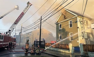 5-Alarm Fire Engulfs Multiple Buildings in Lawrence