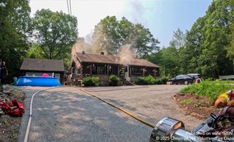 Log Cabin Fire Quickly Contained
