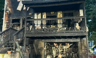 Two-Alarm Fast-Moving House Fire Contained on Lynde Street After Early Morning Response