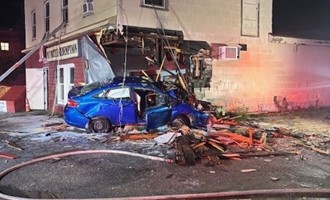 Car Crashes Into Lisbon Street Building, Sparks Early Morning Fire