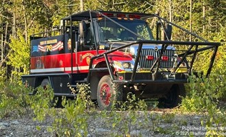 Wildfire contained near homes in Bradford