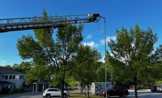 Camden firefighters repair flagpole during training