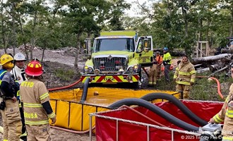 Island Firefighters Join Forces for Nighttime Water Shuttle Drill