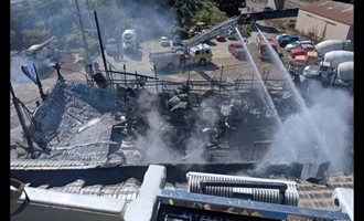 Commercial Facility Blaze: Multi-Agency Response Battles Major Fire at JMI Service Garage