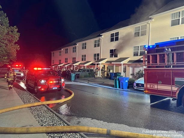 Engine 3 stretched a line through the front door and up the stairs to attack the kitchen fire.