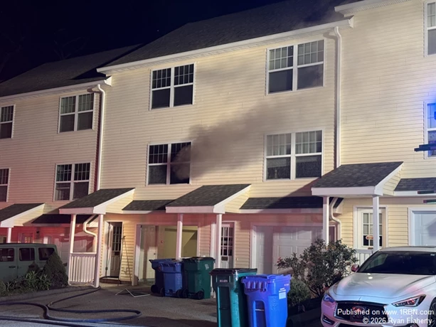 Smoke showing from the second floor.