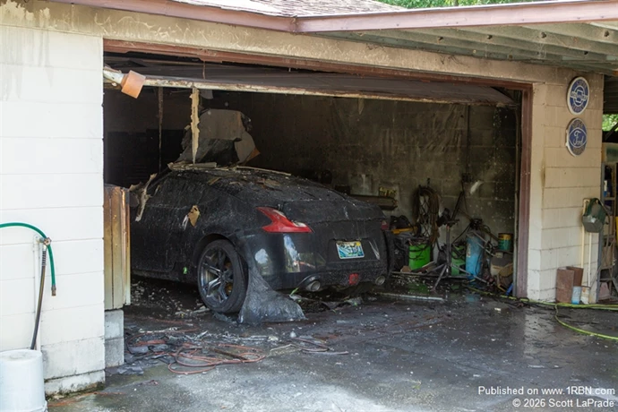 Damaged car in garage