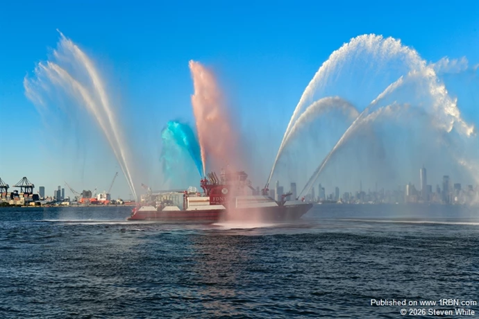 FDNY Fireboat 343 gives a water display at the ceremony.