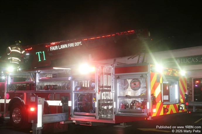 Truck 1 Aerial raised over building