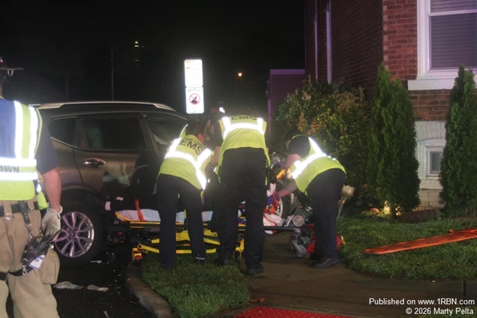 Members of Fair Lawn Volunteer Ambulance Corps removing injured driver from vehicle
