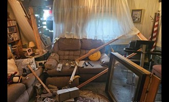 Vehicle Slips Away During Tow Prep, Colliding with Dale Drive Residence