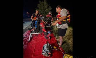 Predawn Water Rescue: Officers Pull Motorist from Sinking Car in Manchester Development