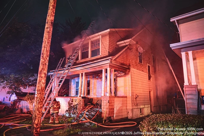 Smoke Pushing From Second Floor of Home 