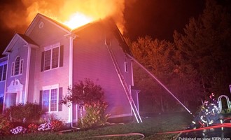 Three-Alarm Fire Destroys Bedford Home on Winding Road