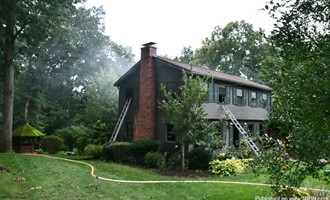Fire Crews Battle Water and Fire at 2 Alarm Structure Fire