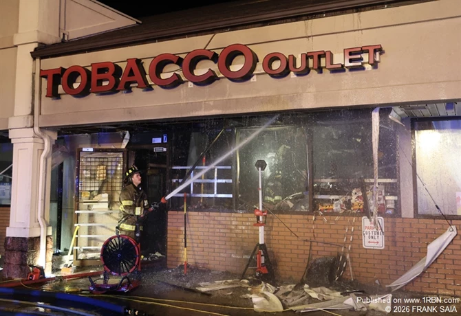 Somerdale FF Billy Barkoff hits some hots spots at the working fire at 624 White Horse Pike, Somerdale, NJ on October 8, 2026.