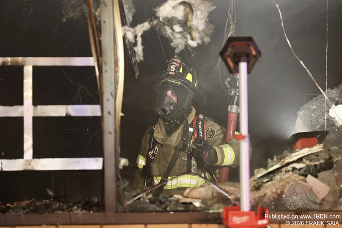 Somerdale FF Billy Barkoff takes a quick breather at the working fire at 624 White Horse Pike, Somerdale, NJ on October 8, 2026.