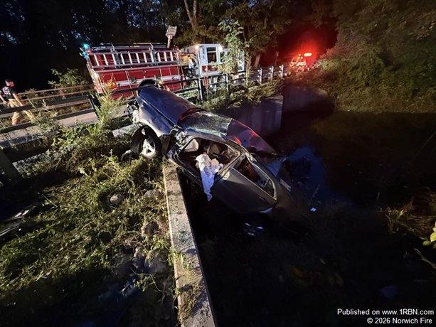 Squad A hooked the car with a grip hoist and then cut the driver