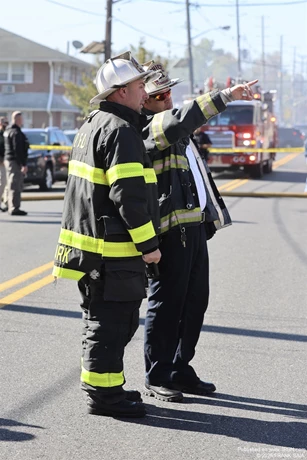 Pennsauken Chief of Department, Jon Hutton, confers with Deputy Chief John Clark at the All Hands fire at 6001 Westfield Avenue, Pennsauken, NJ on October 19, 2026.