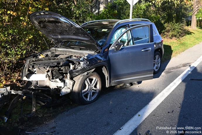 Two vehicle MVA veh strikes pole injuries