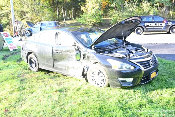 Two vehicle MVA veh strikes pole injuries