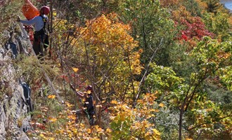 High angle rescue crews retrieve jumper from steep Hawks Nest cliffs