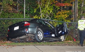 Two-Vehicle Crash in Waltham Leaves Car Hanging Over Embankment