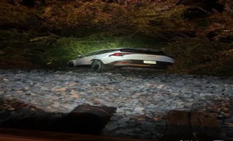Occupants Flee Wreckage on Steep Embankment; Firefighters Assist Police Search Operations