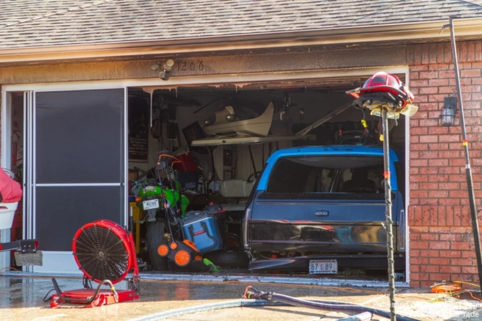 The vehicle in the garage that was a source of the fire.