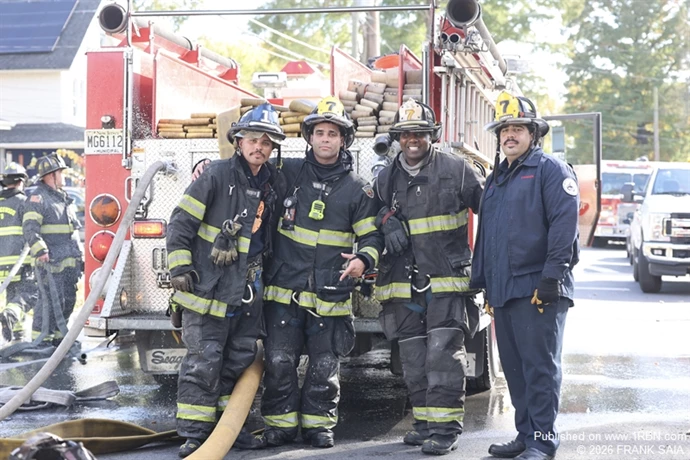 FDE Squad Co 7 poses for a quick group shop before taking up from the working fire at 108 Cooper Avenue, Woodlynne, NJ on October 28, 2026.