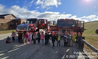 Students from Three Towns Explore Trucks and Tools During Fire Prevention Event