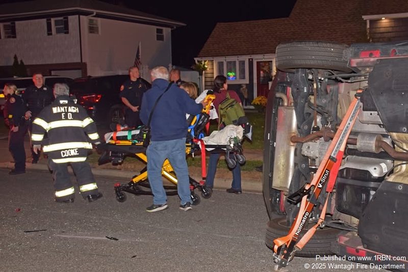 Wantagh Firefighters Extricate Driver from Overturned Vehicle.