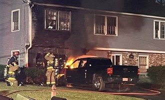 North Hampton Responds to Vehicle Fire Extending to Structure
