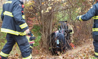 Car Rolls Down Embankment in Manchester