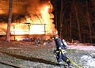 Fire destroys Warner log-cabin