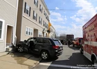 Vehicle Collides With Apartment Building in Whitman