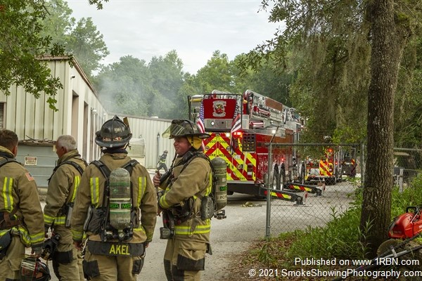 Hudson Firefighters make a quick stop in maintenance shop