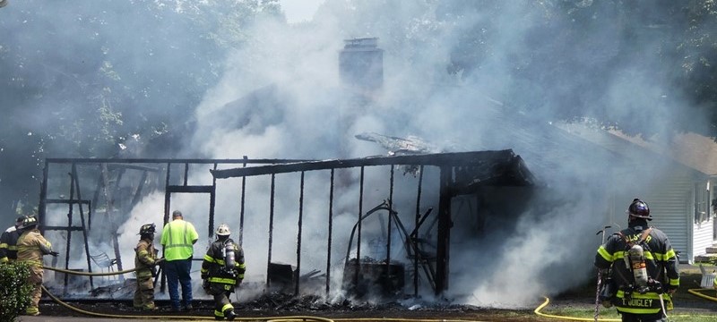 Ruby Garage destroyed, house damaged.
