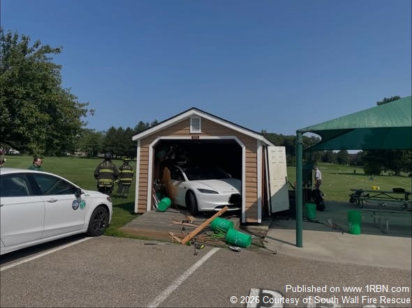 Not Quite the Parking Spot: Car Ends Up Inside Storage Shed