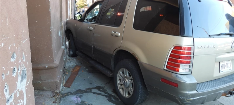 Two vehicle MVA PIAA vehicle into building